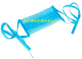 Bind mask machine